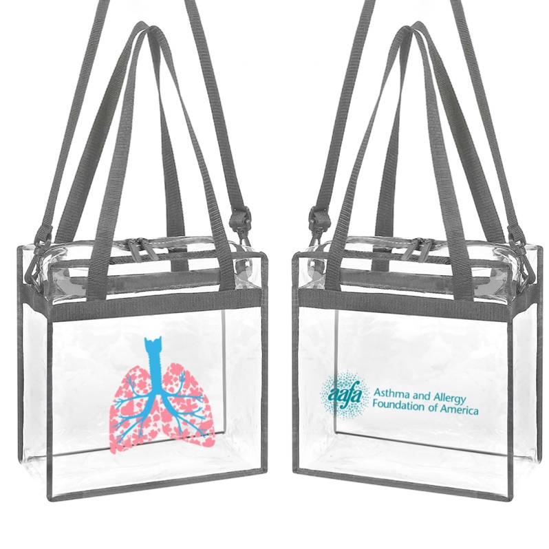 Product Description: Help spread asthma and allergy awareness by using this limited edition stadium tote bag!</br></br>Each purchase of a bag and any additional donations (option to add at checkout) support AAFA’s mission to save lives and reduce the burden of asthma for millions of families.</br></br>Please note - shipping is included in the $25.00 cost of the bag. Quantities are limited.</br></br>Carry more than just your essentials, carry a message that matters. This limited-edition stadium tote bag features artwork created in memory of Hezekiah (Hezzy), a young boy who tragically passed away from asthma in 2024. Designed by his teacher, Janey, the artwork raises awareness and honors his story. You can click here to hear from Janey about creating this special artwork (this link will take you to Instagram).</br></br>12.01"L x 5.98" W x 12.01" H</br>Bag is made of 0.4mm clear thick vinyl</br>Custom artwork on front/AAFA logo on back</br>Gray reinforced nylon handles and bag strap</br>Top zipper closure</br>Spot clean/air dry</br></br>This product is available for U.S. shipping only. For international orders, pleaseContact Usfor a quote on postage.</br></br>Store Home/Awareness Items</br> Awareness Month Limited Edition Stadium Tote Bag